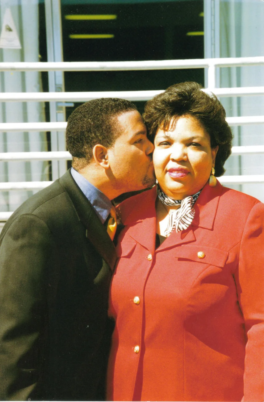 Mervin sharing an affectionate moment with a family member